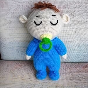 handmade crochet boy doll with pacifier